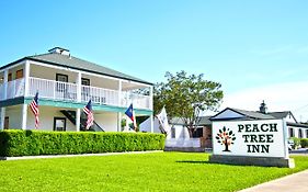 Peach Tree Inn & Suites